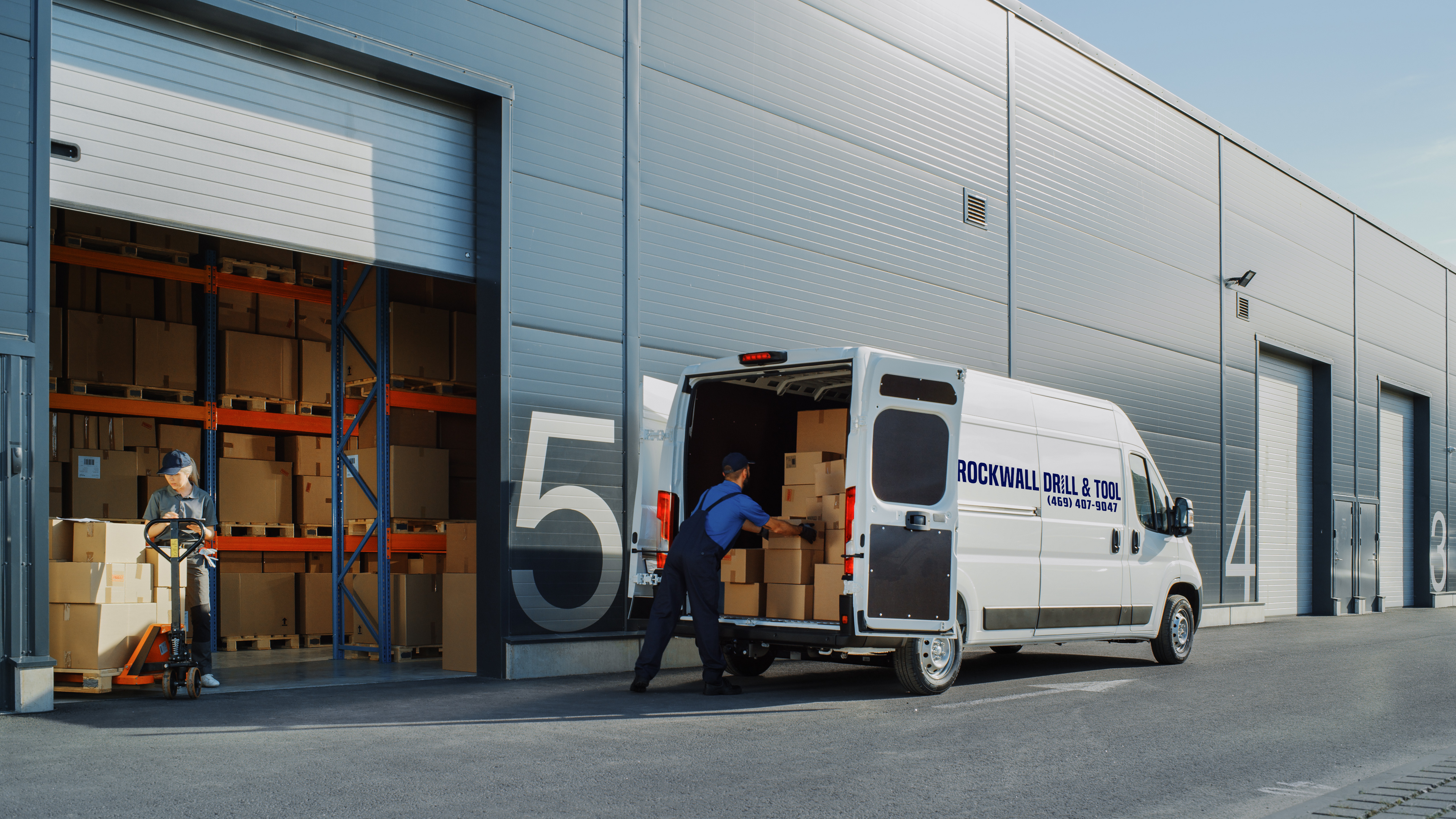 a delivery driver unloading packages for a customer.